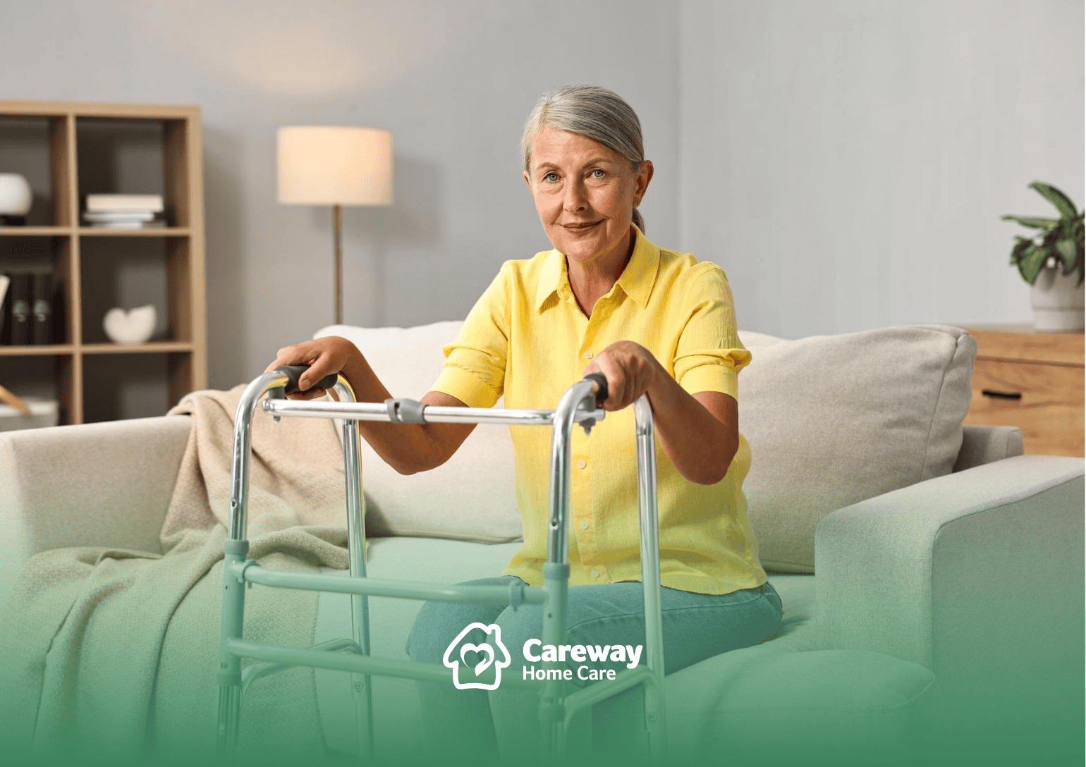 An elderly woman sitting on a couch, holding a walker